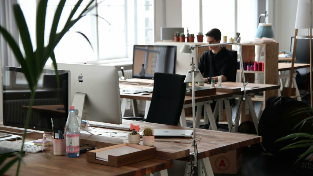 pexels photo 380769 380769 Open-plan office with modern decor and natural lighting, ideal for productivity.